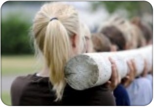 youth carrying log badge